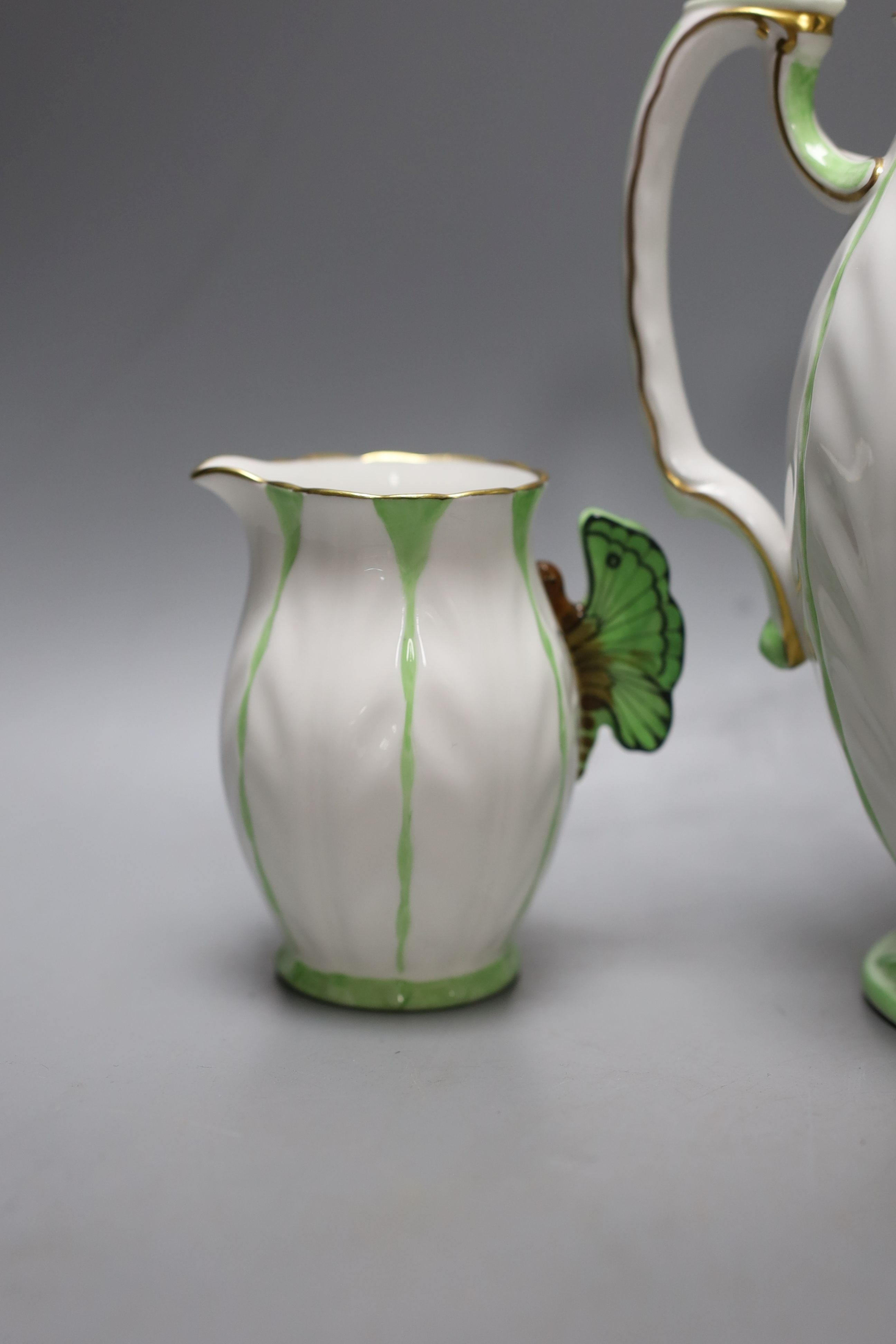 An Aynsley green and white butterfly handled part tea service